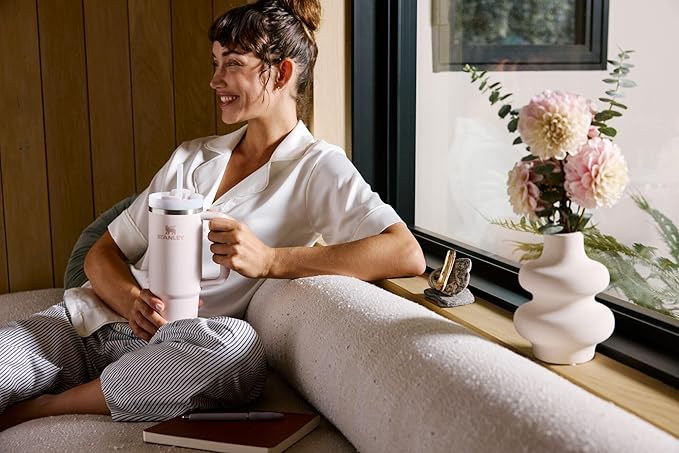 STANLEY Quencher H2.0 Tumbler with Handle and Straw 20 oz | Flowstate 3-Position Lid | Cup Holder Compatible for Travel | Insulated Stainless Steel Cup | BPA-Free | Sunrise Spiral