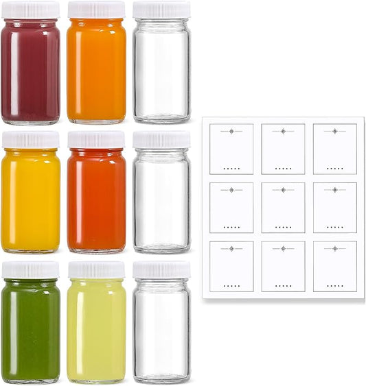 9 Pack 2 oz Glass Shot Bottles w/ White Lids & 9 Labels - Small Clear Jar for Ginger, Wellness Shot, Juice, Sample, Whiskey - Travel Essentials Mini Bottles - Wide Mouth, Leakproof, Dishwasher Safe